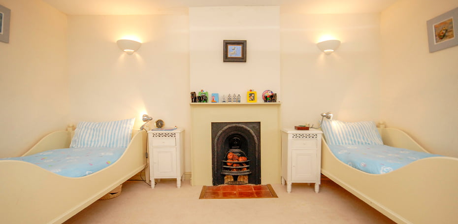a cute blue children's twin bedroom
